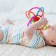 Baby's First Play: When Do Babies Start to Play with Toys? Guide | Baby Care 101: Essential Tips for Happy, Healthy Babies