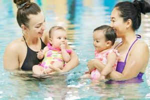 Little Swimmers: Baby Swim Classes Near You + Fun! Baby Care 101: Essential Tips for Happy, Healthy Babies Little Swimmers: Baby Swim Classes Near You + Fun! | Baby Care 101: Essential Tips for Happy, Healthy Babies